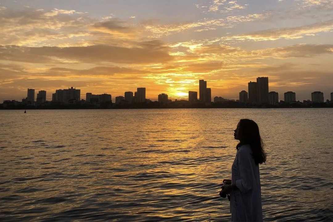 Enjoy the sunset over West Lake