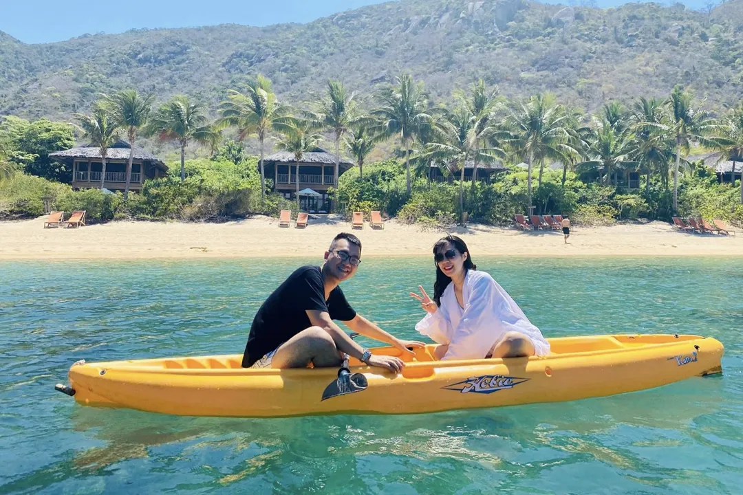 Kayaking on the beach at Six Senses